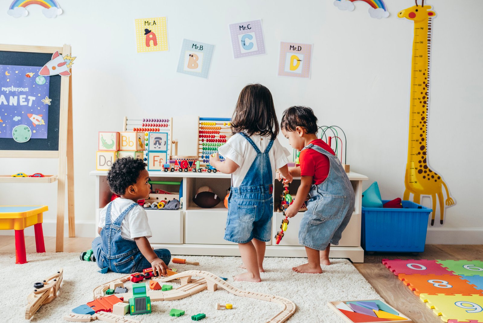 Children playing with toys in a playroom