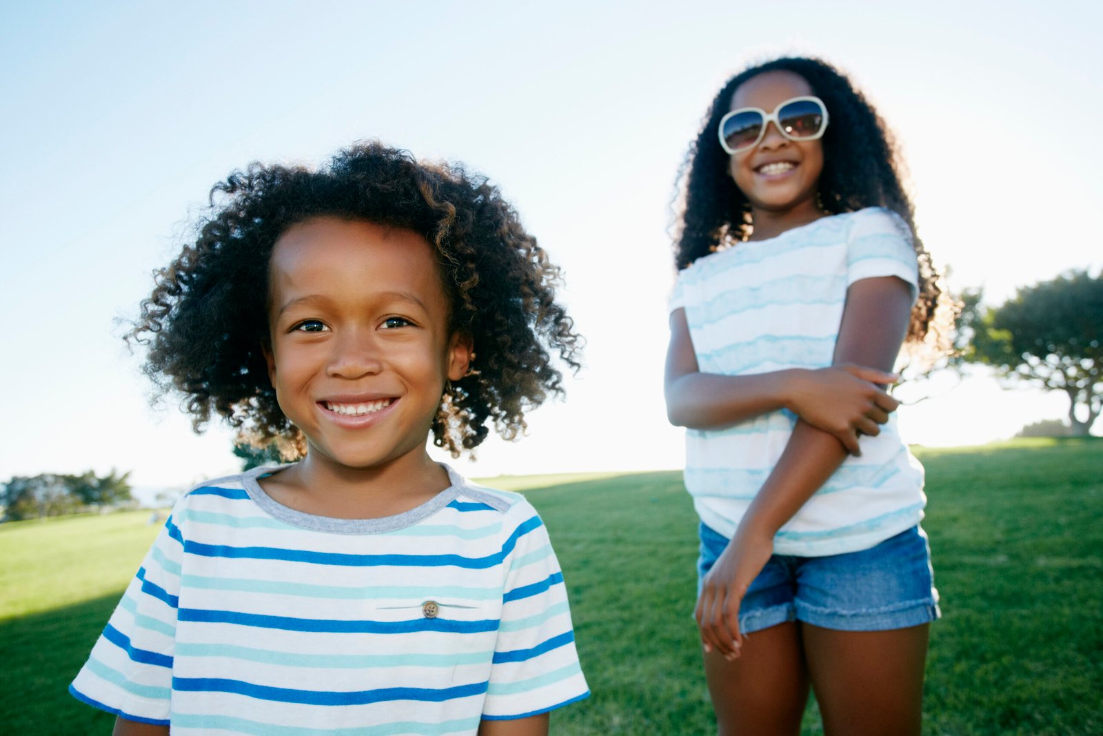 United States,Young mixed race girl and boy, brother and sister, outdoors United States,Young mixed race girl and boy, brother and sister, outdoors